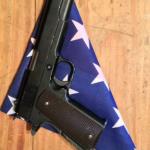 My favorite airsoft picture! 1911 style airsoft on top of a folded US Flag.